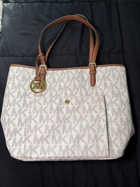 Michael Kors Cream Logo Tote with Brown Trim and Gold Charm